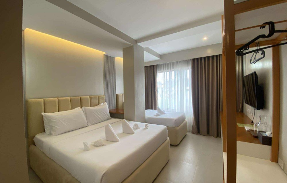 Olive's Suites - Triple Deluxe Room Picture